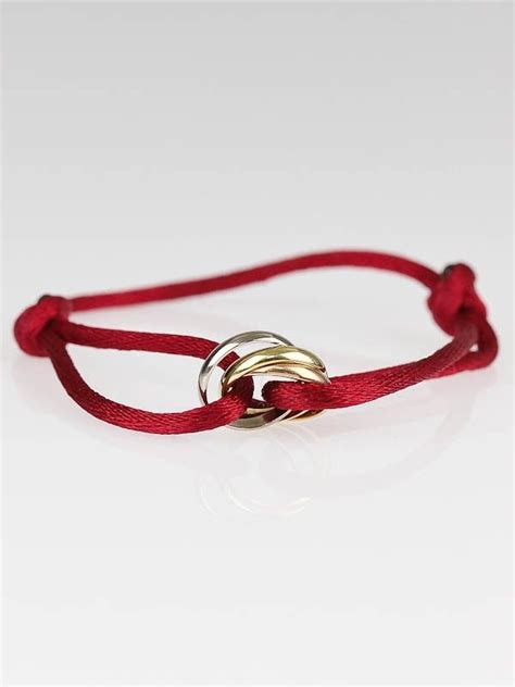 trinity bracelet by cartier red.